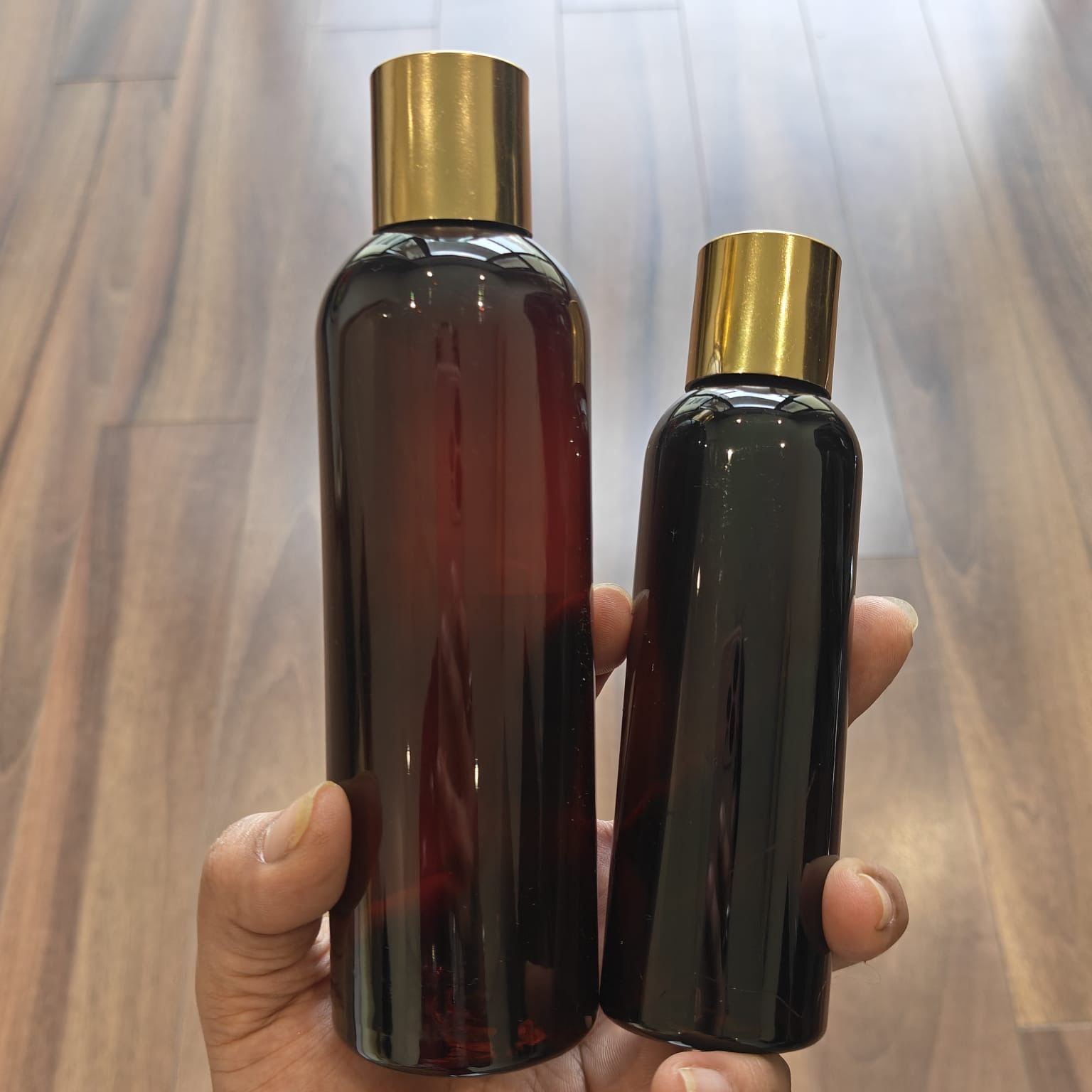 100ml–200ml Long Boston Amber Bottle with Gold Screw Cap