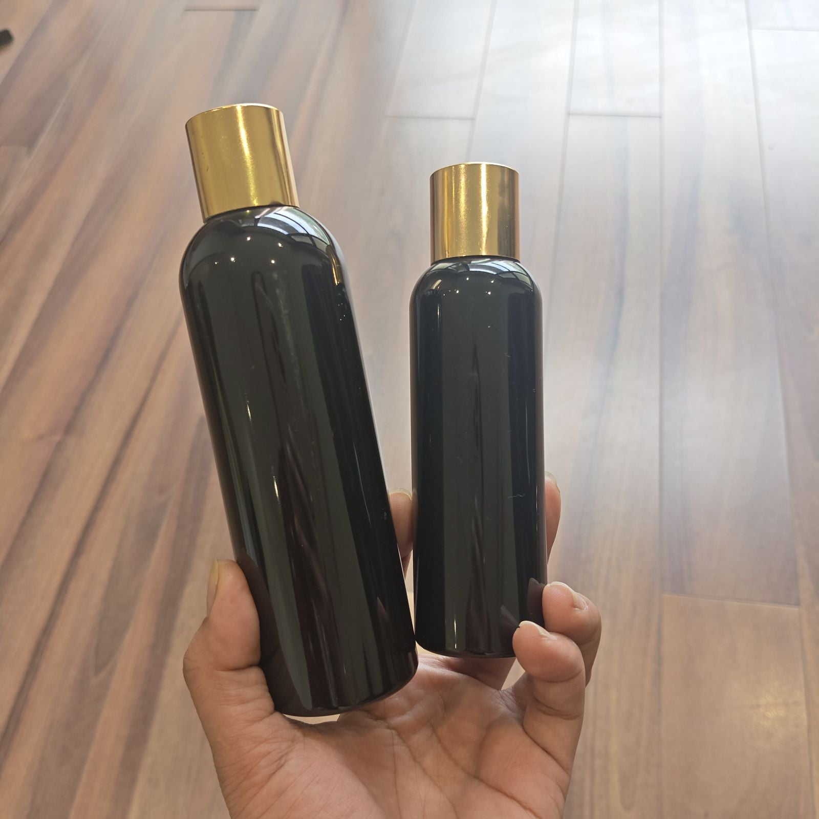 100ml–200ml Long Boston Black Bottle with Gold Screw Cap