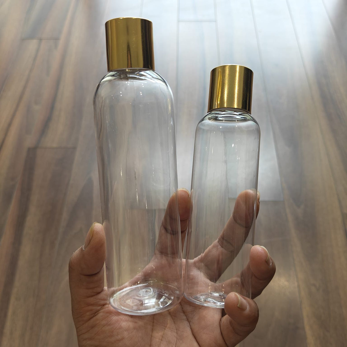 100ml–200ml Long Boston Clear Bottle with Gold Screw Cap