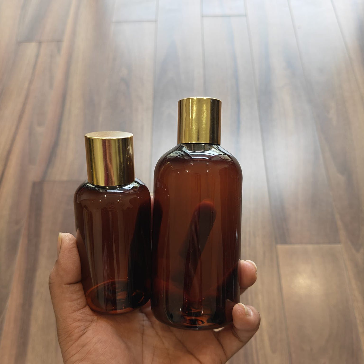 100ml–200ml Short Boston Amber Bottle with Gold Screw Cap