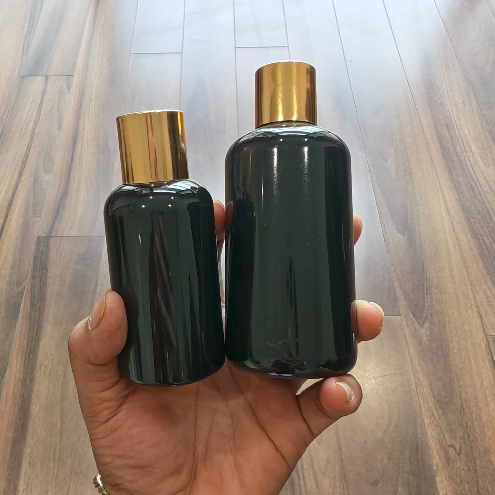 100ml–200ml Short Boston Black Bottle with Gold Screw Cap