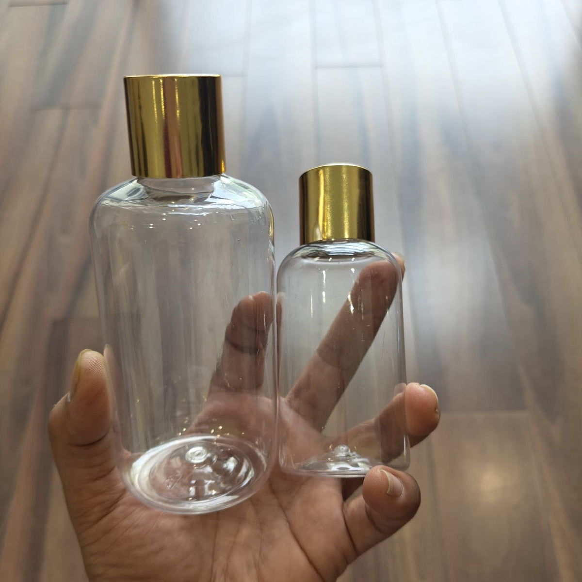 100ml–200ml Short Boston Clear Bottle with Gold Screw Cap