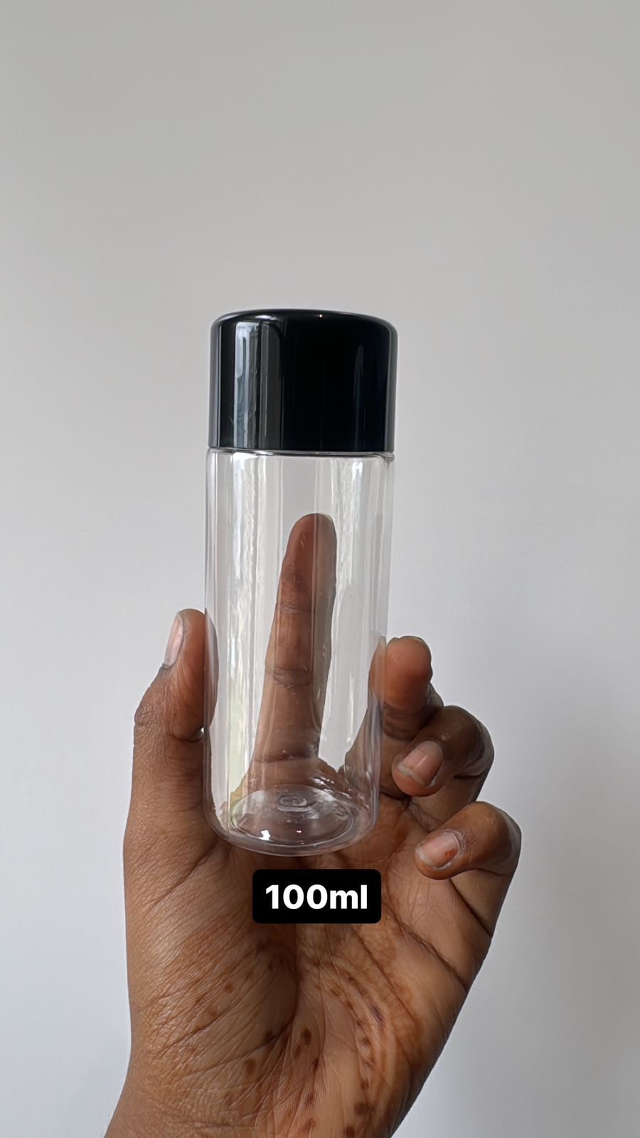 100ml clear pet bottle + black cap + inner